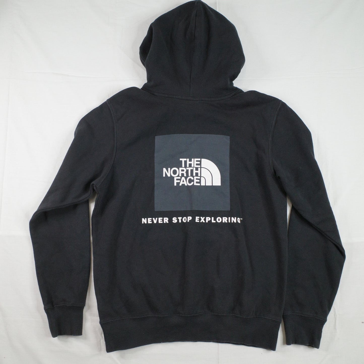 The North Face Graphic Never Stop Exploring Spell Out Black Men’s Small Hoodie