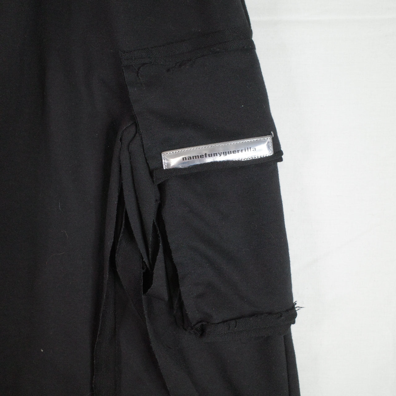 Funny Guerrilla Distressed Black Sweat Pants Uncuffed