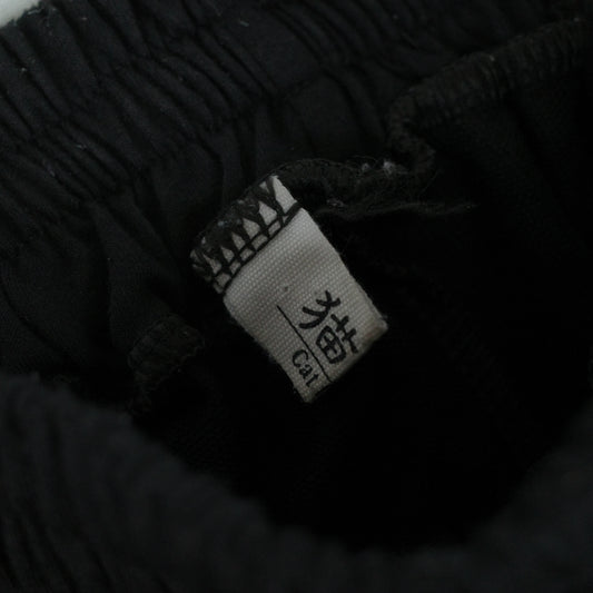 Funny Guerrilla Distressed Black Sweat Pants Uncuffed